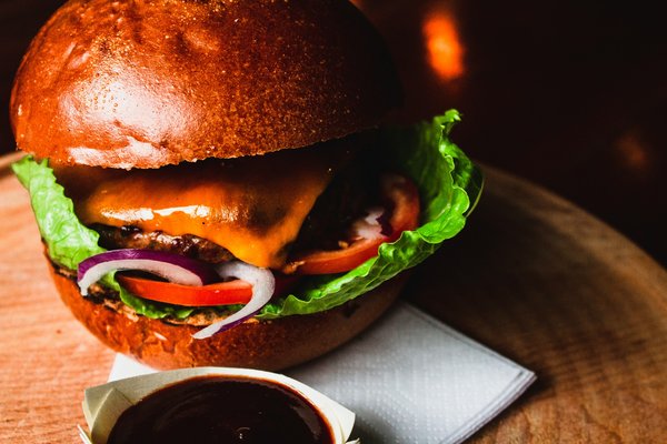 How can you design a kitchen to minimize the temptation of unhealthy late-night snacking?